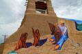 El Santero mural by George Chacon celebrates the Santeros artists who created a culturally important part of New Mexico's heritage. Taos, NM