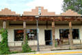 Shop with carved spiral columns. Taos, NM.