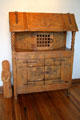 Carved cabinet in Nicolai Fechin studio at Taos Art Museum. Taos, NM.
