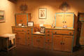 Custom built cabinets with wall murals at Blumenschein Home & Museum. Taos, NM.