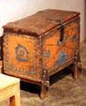 Blue & yellow painted chest on a stand at Hacienda de los Martinez. Taos, NM