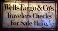 Wells Fargo & Co's Travelers Checks For Sale Here sign at Nevada State Museum. Carson City, NV.
