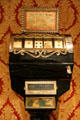 Antique slot machine with wheel of cards by Wills Novelty Co. at Nevada State Museum. Carson City, NV.