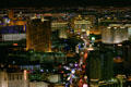 The Strip at night with Wynn, Caesar & Treasure Island Hotel from top of Stratosphere Tower. Las Vegas, NV.