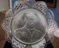 Grover Cleveland pressed glass plate at Buffalo History Museum. Buffalo, NY.