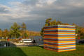 Multicolored sculpted box & lake opposite Albright-Knox Art Gallery. Buffalo, NY.