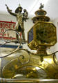 Fireman statue & lamp detail on Weiner parade carriage at FASNY Museum of Firefighting. Hudson, NY.