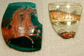 Painted Roman glass fragments with horses & fish at Corning Museum of Glass. Corning, NY.