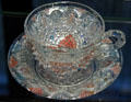 French early pressed glass cup & saucer at Corning Museum of Glass. Corning, NY.