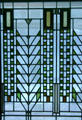 Detail of Tree of Life stained glass window by Frank Lloyd Wright from Darwin D. Martin House, Buffalo at Corning Museum of Glass. Corning, NY.