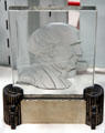 Glass plaque with face in profile by Frederick Carder of Steuben Glass at Corning Museum of Glass. Corning, NY.