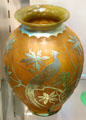 Acid-etched decoration on glass vase with bird on branch by Steuben Glass at Corning Museum of Glass. Corning, NY.