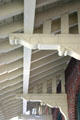 Carved brackets support overhanging roof of Hyde Park Railroad Station. Hyde Park, NY.
