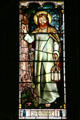 Stained glass windows with Christ in Sage Chapel on Cornell Campus. Ithaca, NY.
