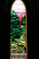 Stained glass windows with pines by Tiffany in Sage Chapel on Cornell Campus. Ithaca, NY.