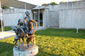 Main entrance for The Hyde Collection with Dancing Family sculpture by Milton Elting Hebald. Glens Falls, NY.