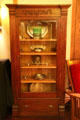 Roycroft display case with Arts & Crafts objects at Roycroft Inn. East Aurora, NY.