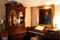 Parlor extension with desk, piano & painting of Fillmore at Millard Fillmore House. East Aurora, NY.