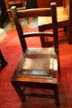 Roycroft side chair with leather seat at Elbert Hubbard Roycroft Museum. East Aurora, NY.