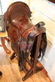 Saddle on Roycroft saddle rack at Elbert Hubbard Roycroft Museum. East Aurora, NY.