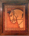 Horse image in modeled leather work by George Scheide Mantel at Elbert Hubbard Roycroft Museum. East Aurora, NY.