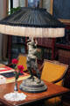 Table lamp with fringed black silk lamp shade in East Room at Eastman House. Rochester, NY.