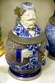 Cobalt blue beer stein in form of man with pipe & smoking jacket from Germany at The Strong National Museum of Play. Rochester, NY