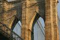 Stonework Gothic arches & cables of Brooklyn Bridge. New York, NY.