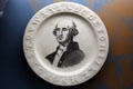 Porcelain plates with Washington's image & alphabet around rim at Federal Hall. New York, NY