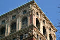 Roofline terra cotta & glazed details of Cass Gilbert's Broadway Chambers Building. New York, NY.