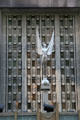 Aluminum winged woman on facade of Waldorf-Astoria Hotel. New York, NY.