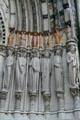 Carved saints & Gothic creatures beside entrance of St. John the Divine. New York, NY.