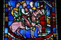 Stained glass shows Theodosius arriving at Ephesus from legend of Seven Sleeping Christian Brothers from cathedral in Rouen, France at The Cloisters. New York, NY.