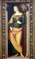 St Lucy holding lamp painting by Perugino at Metropolitan Museum of Art. New York, NY.