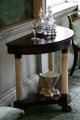 Tripod stand with decanters in front parlor of Morris-Jumel Mansion. New York, NY.