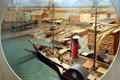 Diorama of steamship on harborfront of early New York City at Museum of the City of New York. New York, NY.