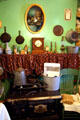 Kitchen stove & shelf of Lithuanian family at Tenement Museum. New York, NY.