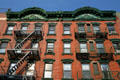 Heritage building with green roofline. New York, NY
