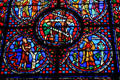 Stained glass window with Old Testament themes of Eve, Babel, & Jonah in Riverside Church. New York, NY