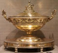 Silver tureen with cover & stand by Charles Percier et al of Paris reputedly given by Napoleon I to his sister Pauline & her husband Prince Camillo Borghese at Metropolitan Museum of Art. New York, NY.