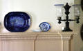 Antique blue-flow plates & mantle lamp at Lefferts Homestead museum. Brooklyn, NY.