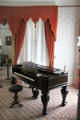 Hallett and Cumston piano of Boston & stool in drawing room at Lindenwald. Kinderhook, NY.