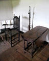 Drop-leaf table, arm chair & adjustable height candlestick in Schenck House at Old Bethpage Village. Old Bethpage, NY.