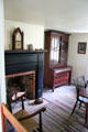 Parlor fireplace & china cabinet in Conklin House at Old Bethpage Village. Old Bethpage, NY.