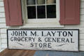 John M. Layton Grocery & General Store sign at Old Bethpage Village. Old Bethpage, NY.