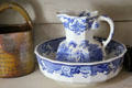 Pitcher & wash basin with blue transfer print scenes in Layton General Store at Old Bethpage Village. Old Bethpage, NY.