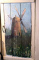 Windmill in a field painted on door by Annie Cooper Boyd at Boyd House museum. Sag Harbor, NY.