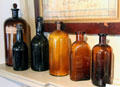 Medicine bottles related to the products of Dr. Edgar Miles at Annie Cooper Boyd House museum. Sag Harbor, NY.
