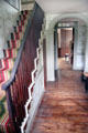 Front hall with vintage narrow stair case at Custom House Museum. Sag Harbor, NY.
