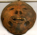 Eskimo mask made of driftwood and inlaid with teeth at Sag Harbor Whaling Museum. Sag Harbor, NY.